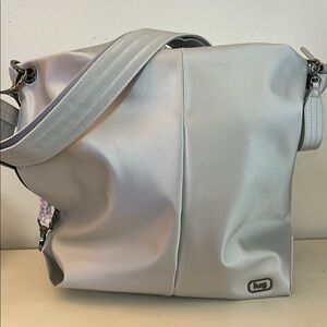 Lug- Satin-Luxe Large Hobo -Plunge
Silver Vegan Satin Luxe fabrication.